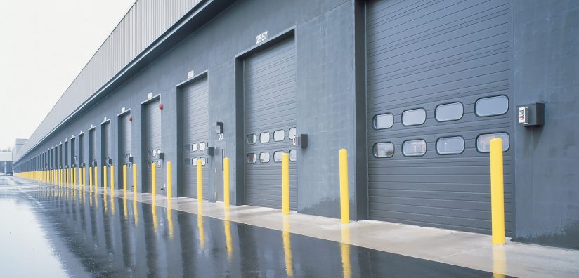 A row of commercial overhead doors.